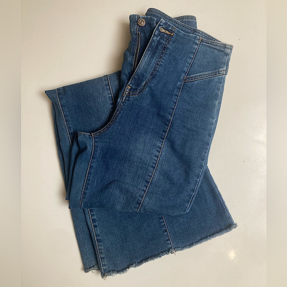 Flare leg vintage wash jeans.